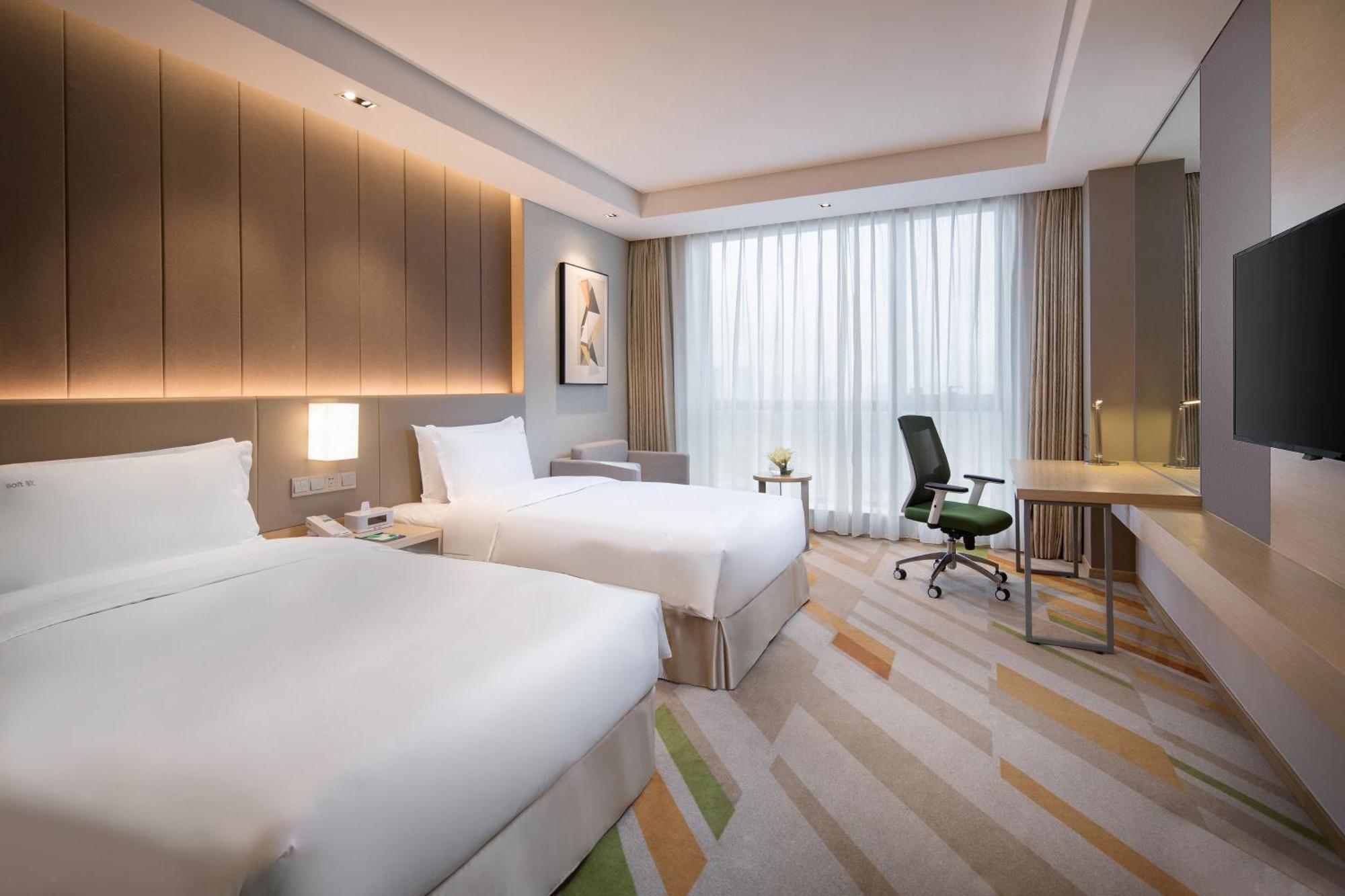 Holiday Inn Wuxi Taihu New City By Ihg Екстер'єр фото